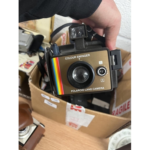 394 - Kodak Instamatic digital camera together with others