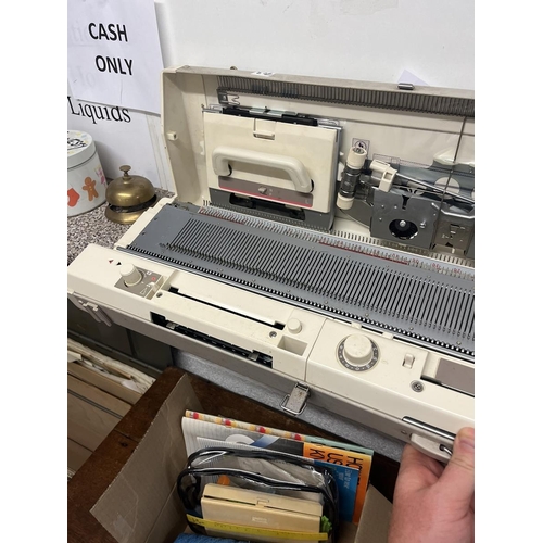 404 - Brother KH891 knitting machine in case with accessories and instructuions