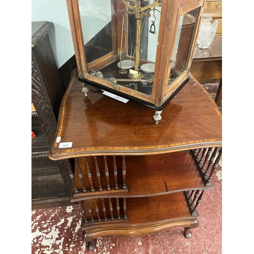 431 - Inlaid mahogany revolving bookcase