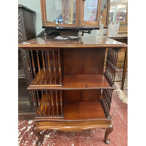 431 - Inlaid mahogany revolving bookcase