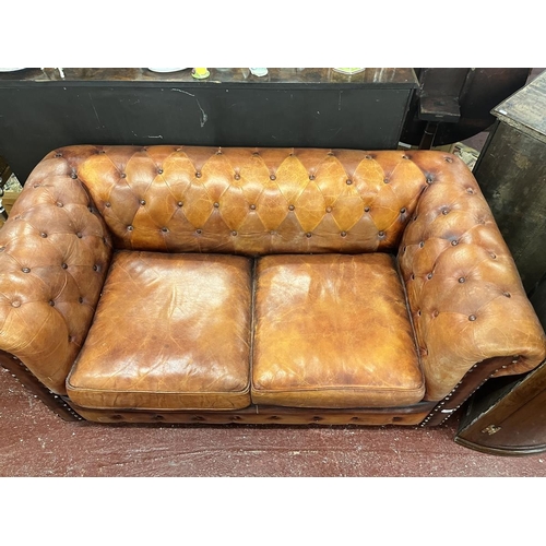 446 - Distressed tan leather 2 seater Chesterfield 