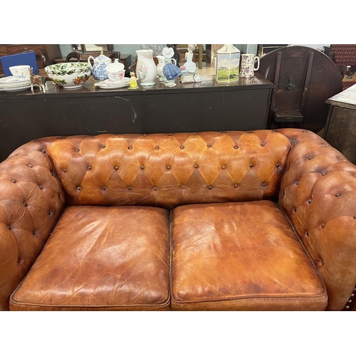 446 - Distressed tan leather 2 seater Chesterfield 