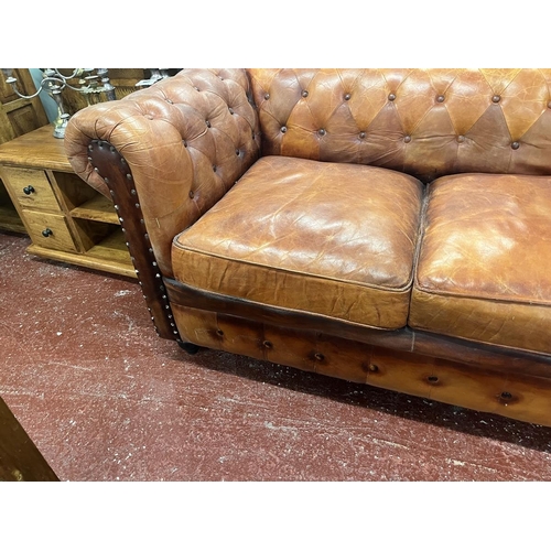 446 - Distressed tan leather 2 seater Chesterfield 