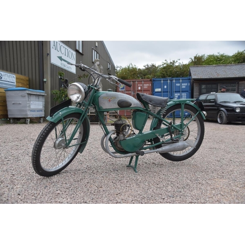 464 - 1932 Motobecane 125cc hardtail vintage motorcycle. Dry stored for 35 years. Runs. No documents.