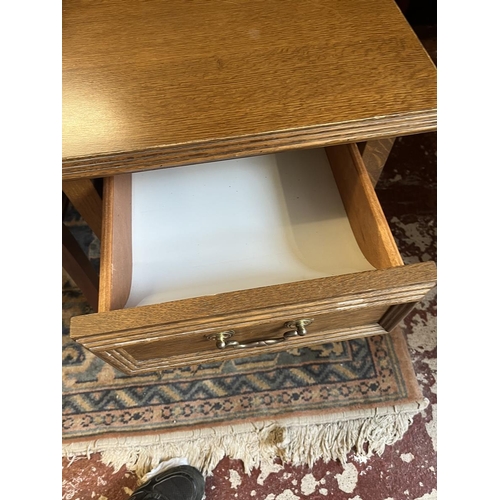 466 - Pair of oak bedside tables