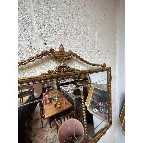 485 - Ornate gilt framed bevelled glass mirror