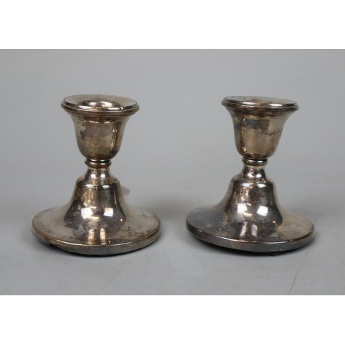 25 - Collection of hallmarked silver to include a pair of candlesticks