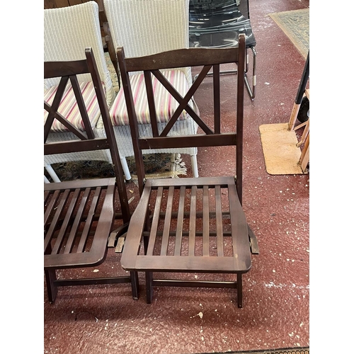 103 - 2 teak folding garden chairs