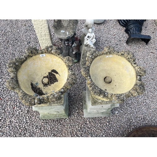 231 - Pair of garden urns on plinths - Approx height: 84cm