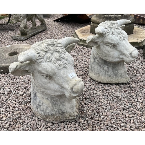 415 - Pair of stone bulls heads - Approx height: 46cm