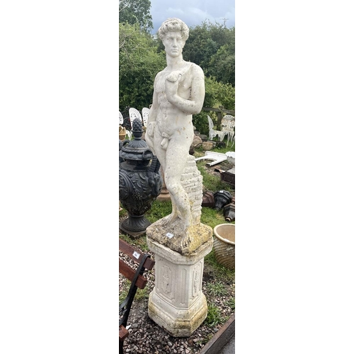 481 - Stone statue of David on plinth - Approx height: 182cm