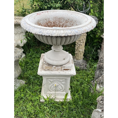 570 - Metal pedestal planter on stone plinth - Approx height: 84cm