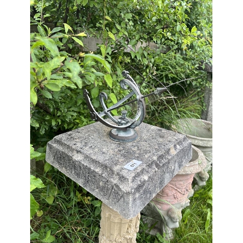 571 - Metal armillary on stone base