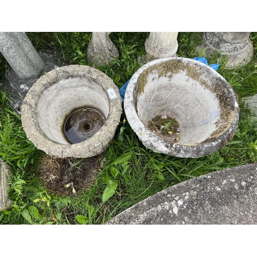 581 - 2 circular stone planters