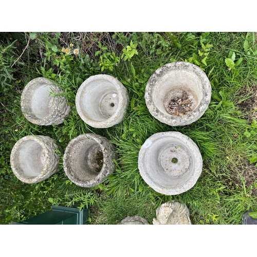 587 - Set of 6 circular stone planters