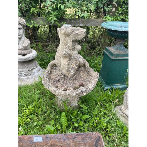 589 - Stone fountain adorned with 2 otters