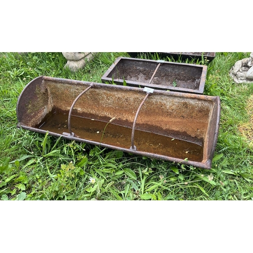 594 - Antique cast iron feeding trough