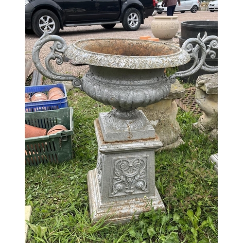 607 - Pair of cast iron pedestal planters on plinths - Approx height: 80cm