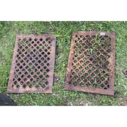 609 - Pair of heavy metal grates