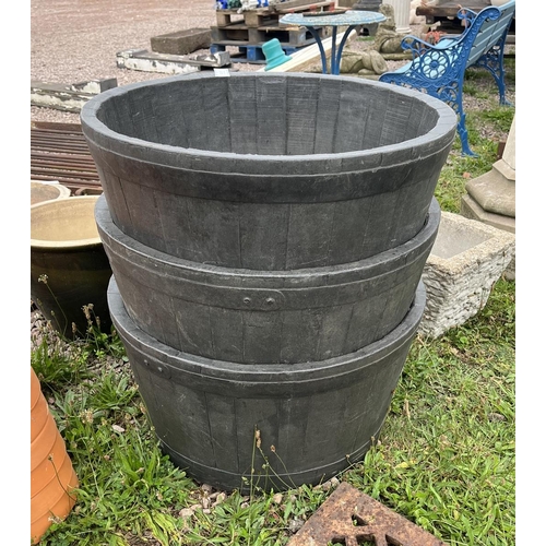 610 - 3 plastic planters in the form of half barrels