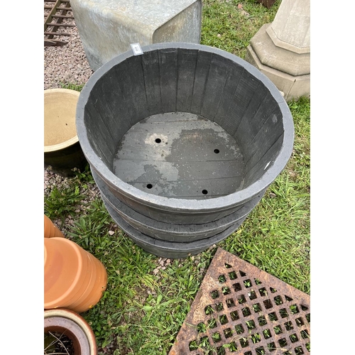 610 - 3 plastic planters in the form of half barrels