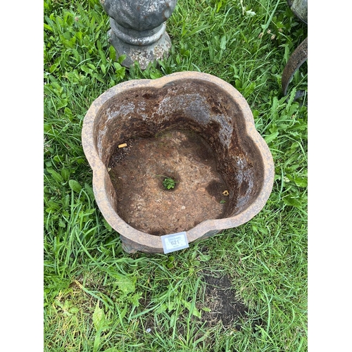 621 - Cast iron planter adorned with lions 