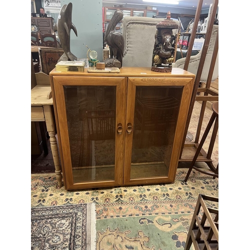 457 - Ercol blonde elm bookcase