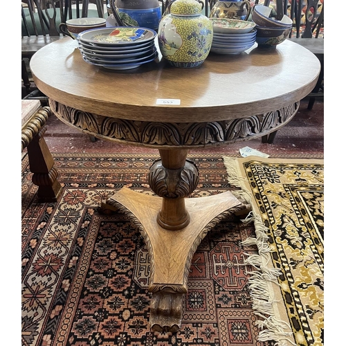 553 - Carved oak occasional table