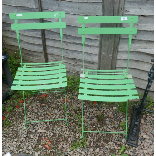 582 - Pair of green folding garden chairs