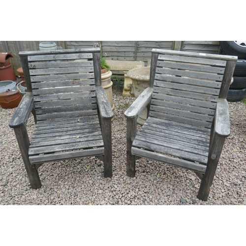 586 - Pair of wooden garden chairs