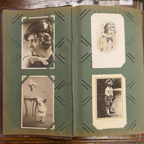 154 - Album of early postcards