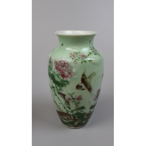 199 - Oriental hand painted milk glass vase together with a ginger jar