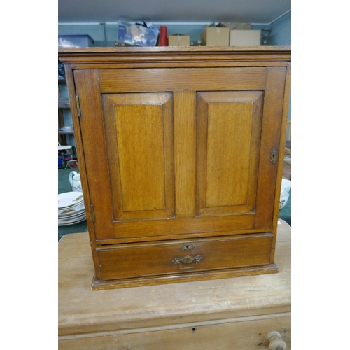 286 - Oak table cupboard - Approx size: Width 55cm Depth 28cm Height 60cm