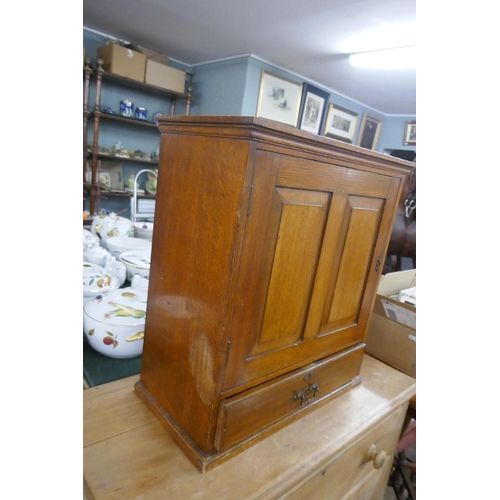 286 - Oak table cupboard - Approx size: Width 55cm Depth 28cm Height 60cm