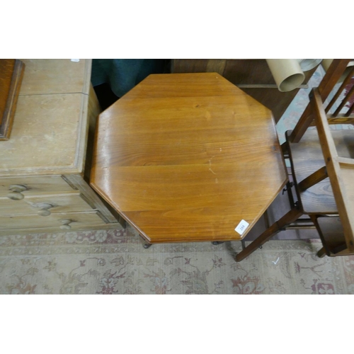 288 - Octagonal occasional table on castors