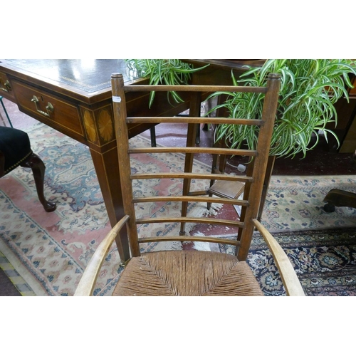 443 - Rush seated ladder back armchair 