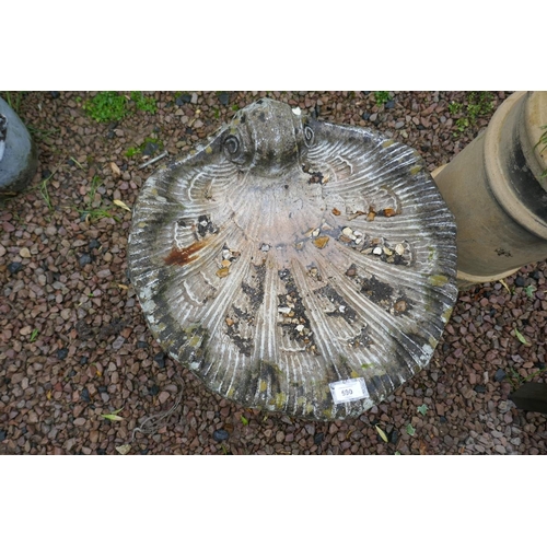 590 - Stone shell birdbath 