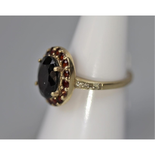 70 - Gold garnet set ring - Size N