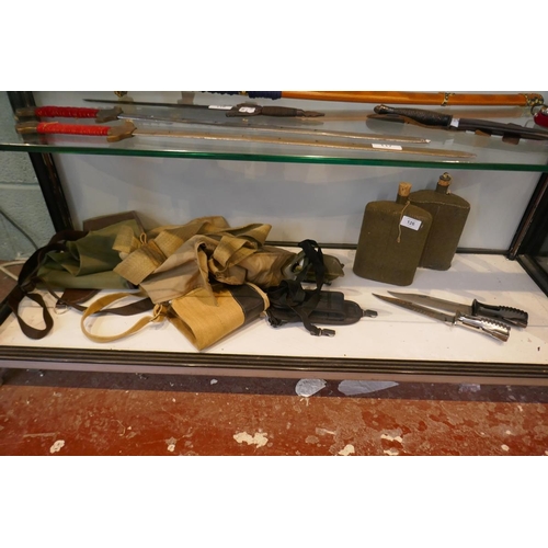 126 - SA80 bayonet together with another and first aid pouches and water bottles etc.