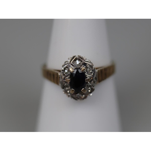 37 - 9ct gold sapphire and diamond cluster ring - Size: O