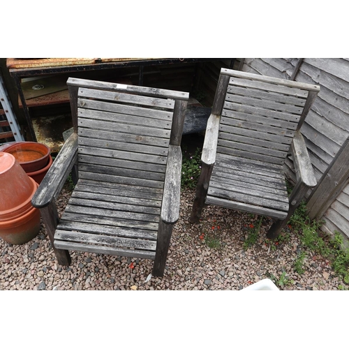 372 - Pair of wooden garden chairs