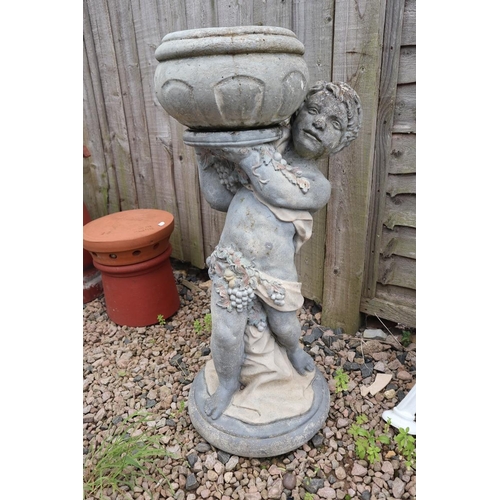 377 - Stone statue of boy holding plant pot - Approx height 75cm