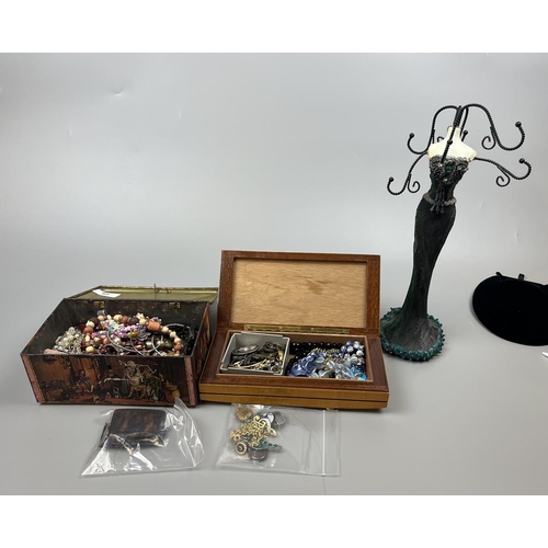 65 - Collection of costume jewellery to include jewellery stand