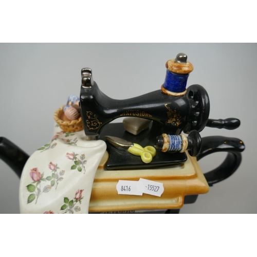 109 - Novelty ceramic teapot of a sweing machine marked Infusion