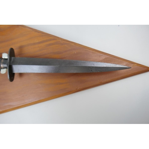 120 - Fairbairn Sykes style commando dagger mounted on wall plaque