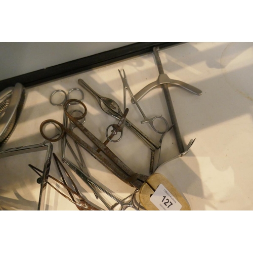 127 - Collection of surgical medical instruments to include W&H Hutchison curved needle set