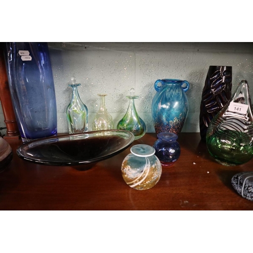 141 - Collection of colourful glass to include iridescent scent bottles