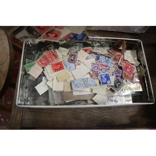 209 - Stamps - World in biscuit tin for sorting