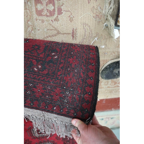 214 - Red patterned runner - Approx size: 292cm x 77cm