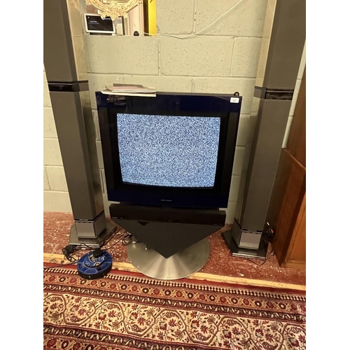 232 - Bang and Olufsen media centre with floor standing speakers to include remote control and manuals